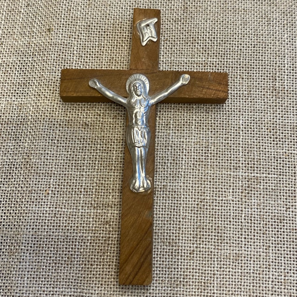 Wooden crucifix with silver metal Christ.